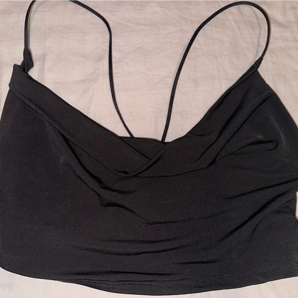 VNTG brand crop top with spiderweb back and gold ring